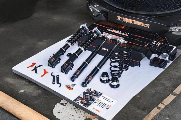 Complete suspension kit with front and rear shocks and springs designed for improved ride quality and handling.